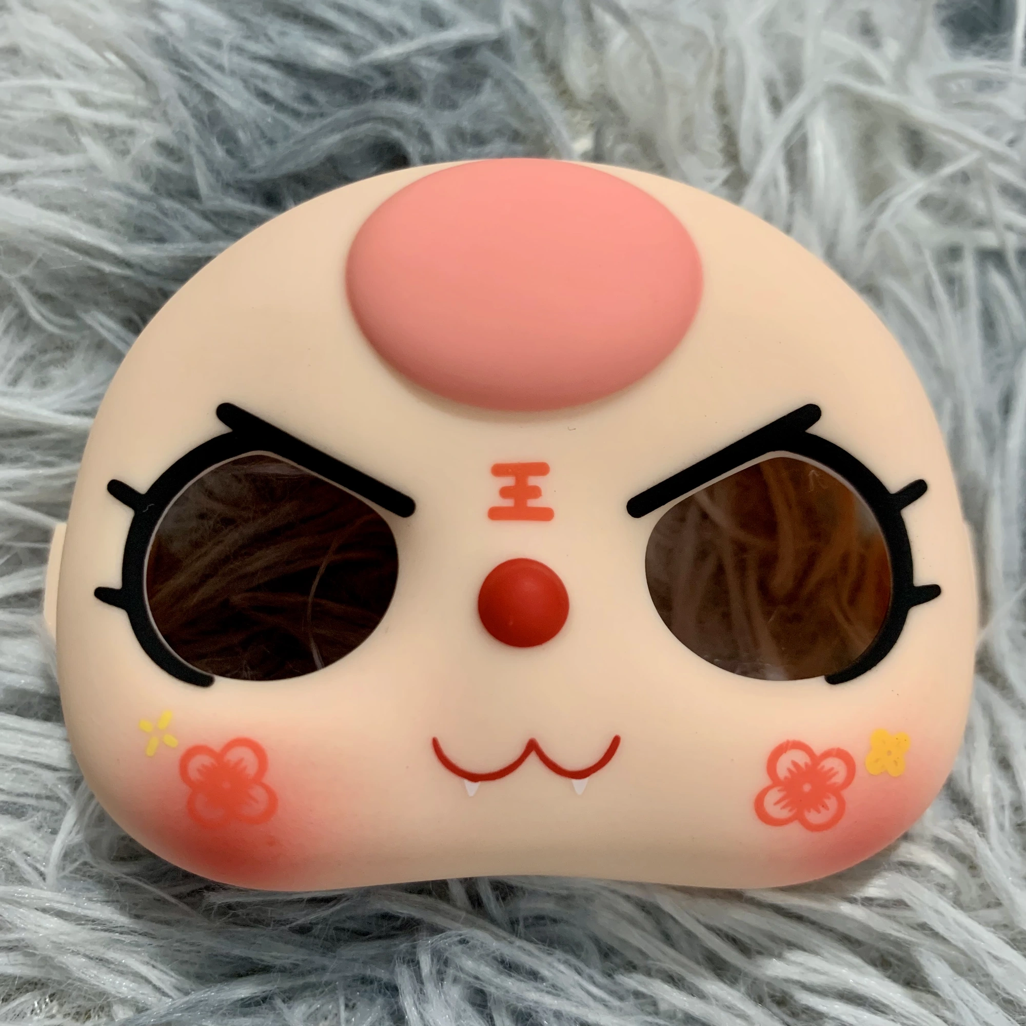 Tóc hồng miệng mèo má hoa